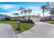 Beautiful single Gathering home with a brick driveway and lush tropical landscaping at 1217 Bobwhite Court, Punta Gorda, FL 33950