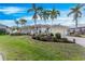 Charming home with a brick driveway, 2-car garage and manicured landscaping at 1217 Bobwhite Court, Punta Gorda, FL 33950