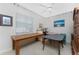 Bright office featuring tables, neutral walls, and a ceiling fan for added comfort at 1217 Bobwhite Court, Punta Gorda, FL 33950