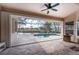 Inviting screened-in patio overlooking a private pool and picturesque canal at 1217 Bobwhite Court, Punta Gorda, FL 33950