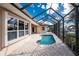 Charming screened-in pool with water views at 1217 Bobwhite Court, Punta Gorda, FL 33950