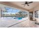 Relaxing outdoor pool area with screen enclosure and waterfront views at 1217 Bobwhite Court, Punta Gorda, FL 33950