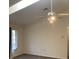 Neutral bedroom with a skylight, ceiling fan, and a window for natural light at 20408 Andover Ave, Port Charlotte, FL 33954