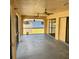 Spacious screened-in patio with ceiling fans, great for outdoor entertaining at 20408 Andover Ave, Port Charlotte, FL 33954