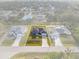 Aerial view highlighting the property lines and landscaping at 2405 Vancouver Ln, North Port, FL 34286