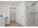 Bathroom showing a tiled shower, toilet area and vanity with modern fixtures at 2405 Vancouver Ln, North Port, FL 34286
