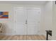 View of the front double doors from inside the entry way of the home at 2405 Vancouver Ln, North Port, FL 34286