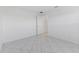 This bedroom features marble tile flooring, white walls, and standard closet at 24344 Penhollow Ct, Punta Gorda, FL 33955