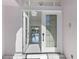 Grand entryway with double doors that lead into a spacious living area at 24344 Penhollow Ct, Punta Gorda, FL 33955