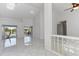 Bright living room with high ceilings, sleek tile floors, and great natural light at 24344 Penhollow Ct, Punta Gorda, FL 33955