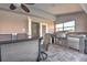 Outdoor kitchen area with stainless steel grill and built-in storage, perfect for summer barbecues at 24344 Penhollow Ct, Punta Gorda, FL 33955