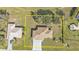 Bird's eye view of home showing backyard, complemented by lush green lawn at 25202 Chiclayo Ave, Punta Gorda, FL 33983