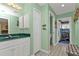 Bathroom showcasing vanity with green marble countertop at 25202 Chiclayo Ave, Punta Gorda, FL 33983