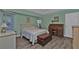 Bedroom with a wooden desk and spacious closet at 25202 Chiclayo Ave, Punta Gorda, FL 33983