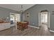 Cozy dining area with natural light and modern flooring near the kitchen at 25202 Chiclayo Ave, Punta Gorda, FL 33983