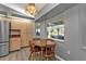 Cozy dining nook next to the kitchen, with natural light at 25202 Chiclayo Ave, Punta Gorda, FL 33983