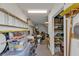 Well-organized storage area with shelving and ample space for tools and equipment at 25202 Chiclayo Ave, Punta Gorda, FL 33983