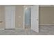 Bathroom with white cabinets and tile flooring at 26300 Rampart Blvd # 404, Punta Gorda, FL 33983