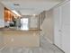 Kitchen with stainless steel appliances and tile flooring at 26300 Rampart Blvd # 404, Punta Gorda, FL 33983