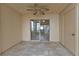 Sunroom with tile flooring and sliding glass door at 26300 Rampart Blvd # 404, Punta Gorda, FL 33983