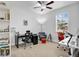 Home office space with multiple computer desks and an ergonomic chair at 2822 Logsdon St, North Port, FL 34287