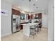 Gourmet kitchen with stainless steel appliances and granite countertops at 2822 Logsdon St, North Port, FL 34287