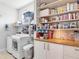 Well-organized pantry featuring ample shelving, storage containers, and an abundance of food items and goods at 2822 Logsdon St, North Port, FL 34287