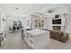 Bright kitchen with an island overlooking the dining room and living spaces at 3049 Seth Rd, North Port, FL 34288