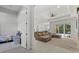 Bright and airy living room featuring modern design elements, an open layout, and a view to the outside at 3049 Seth Rd, North Port, FL 34288