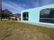 Arched window and exterior view of a well-maintained property at 3289 Pellam Blvd, Port Charlotte, FL 33948
