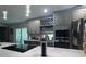 Close up of island in modern kitchen with stainless steel appliances and stylish fixtures at 3289 Pellam Blvd, Port Charlotte, FL 33948