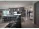 Open concept living area with a large kitchen island and stainless steel appliances at 3289 Pellam Blvd, Port Charlotte, FL 33948