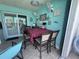 Outdoor dining table under the patio with seating at 3289 Pellam Blvd, Port Charlotte, FL 33948