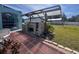 Patio with a brick outdoor grill, great for entertaining in the backyard at 3289 Pellam Blvd, Port Charlotte, FL 33948
