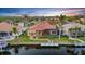 Captivating waterfront home with a private dock, screened-in patio, and lush landscaping at 3321 Tripoli Blvd, Punta Gorda, FL 33950