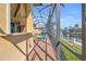 Relaxing waterfront backyard featuring a screened-in lanai with a pool and canal view at 3321 Tripoli Blvd, Punta Gorda, FL 33950