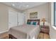 Cozy bedroom with a ceiling fan, an area rug, and a window for natural light at 3321 Tripoli Blvd, Punta Gorda, FL 33950