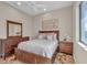 Comfortable bedroom featuring an area rug, a window, and an art piece on the wall at 3321 Tripoli Blvd, Punta Gorda, FL 33950