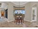 Cozy dining area features a bay window offering serene backyard and pool views at 3321 Tripoli Blvd, Punta Gorda, FL 33950