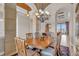 Spacious dining room featuring stone columns, decorative ceilings, and ample natural light at 3321 Tripoli Blvd, Punta Gorda, FL 33950