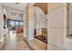 Home entrance foyer leading to the kitchen, living room, and backyard; features elegant stone columns at 3321 Tripoli Blvd, Punta Gorda, FL 33950