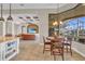 Open-concept eat-in kitchen offering a center island with seamless flow into the adjacent living area at 3321 Tripoli Blvd, Punta Gorda, FL 33950