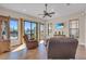 Open living room with tile floors and lots of natural light overlooking the waterfront view at 3321 Tripoli Blvd, Punta Gorda, FL 33950