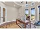 Home office featuring a tray ceiling, multiple windows, and a comfortable desk at 3321 Tripoli Blvd, Punta Gorda, FL 33950