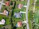 Bird's-eye view highlighting a landscaped property near a golf course and community amenities at 5131 Appomattox Dr, North Port, FL 34287