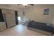 bedroom with a ceiling fan, closet storage, and bright white flooring at 5131 Appomattox Dr, North Port, FL 34287