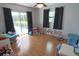 Spacious bedroom with ample playing area, a ceiling fan, and wood flooring at 5131 Appomattox Dr, North Port, FL 34287