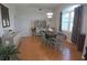 Elegant dining room with contemporary lighting and coordinated decor at 5131 Appomattox Dr, North Port, FL 34287