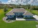 Beautiful single-story home featuring landscaped yard, concrete driveway and tile roof at 5131 Appomattox Dr, North Port, FL 34287