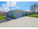 Lovely single-story home featuring an attached garage, beautiful paint, and manicured shrubs at 5131 Appomattox Dr, North Port, FL 34287